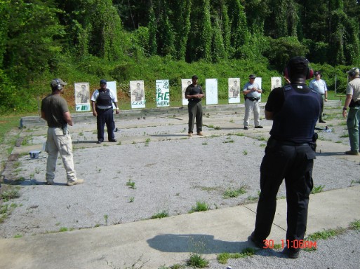 Instructor Leon S. Adams talking to Security Professionals on the firing line during Handgun Street Ready Skills