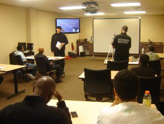 Instructor Hibner goes over classroom portion prior to hitting the firing line