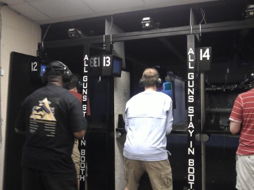 Instructor Leon S. Adams going over a course of fire on Handgun Safety during Handgun Skills for Personal Defense