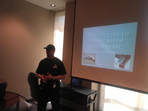 Instructor hibner teaches about the basics of Handgun Safety during Introduction to Handguns for Self Defense
