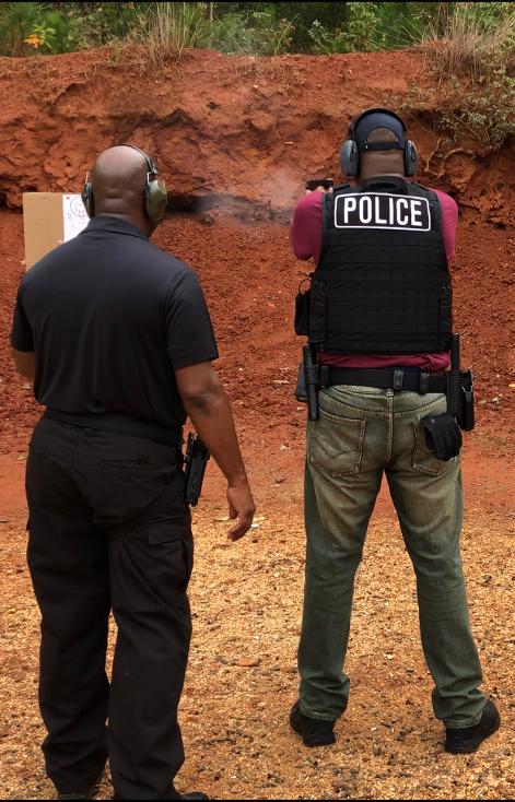 Instructor Leon S. Adams assisting law enforcement officers build proficiency skills